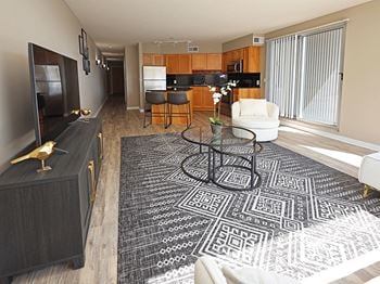 Model suite with all new lvt hard surface flooring in the living areas - stonebridge waterfront in flats district cleveland oh